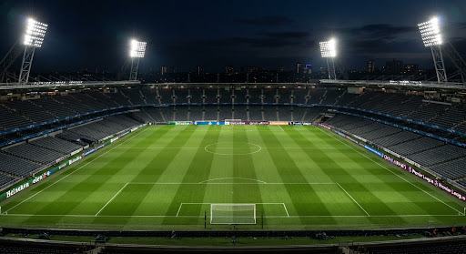 A floodlit football stadium